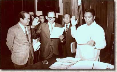Angel Lejano Limjoco, Jr. being sworn in as Securities and Exchange Commissioner of the Philippines by his friend, President Ferdinand E. Marcos.