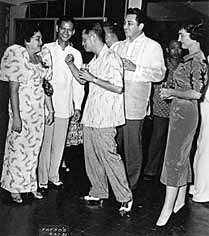 L to R:  Mrs. Cabangbang, Ray, the late Columnist Doroy Valencia, Senator Rogelio De la Rosa, Helen.