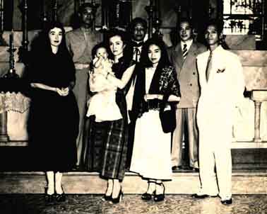 L to R front: Helen, Maria Aurora Quezon, daughter of President Manuel L.Quezon  holding Diana Jo, Christine Ledesma, Ramon Limjoco.- Batangas Basilica