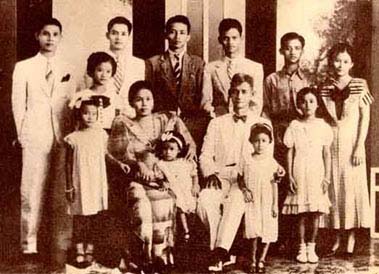 Family Of Dr. Greogio Limjoco-Back: Gregorio Limjoco Jr., Elvira,  Jose Limjoco, Francisco,  Ramon, Cesar, Lydia  Front:  Eva, Lola Feling holding Milagros, Lolo Goyo Holding Aurora, Amparo.