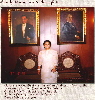 Aurora L. Pastor w/ portraits of Pres. Quezon and President Jose Laurel, her Godparents Aurora L. Pastor w/ portraits of Pres. Quezon and President Jose Laurel, her Godparents