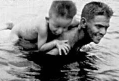 Randy Limjoco piggy back on dad at the beach in Batangas, Philippines, 1947.